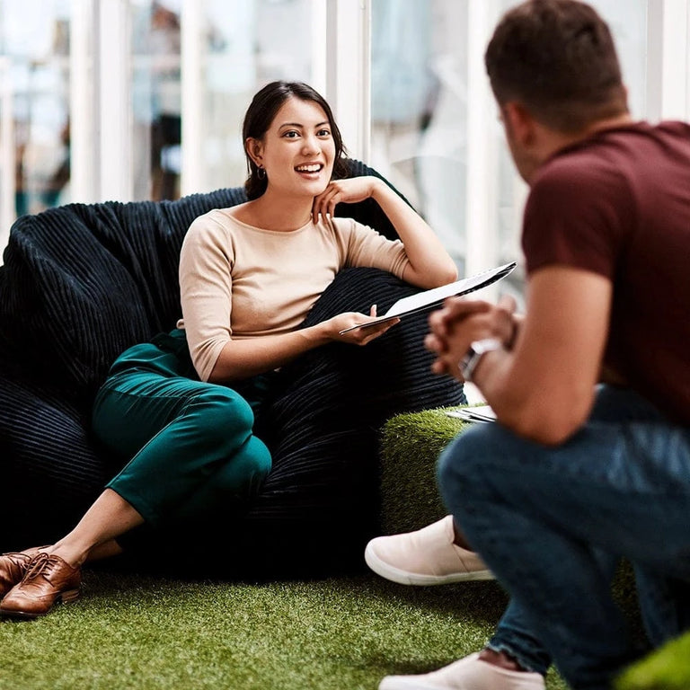 teenagers in class sitting on beanbags